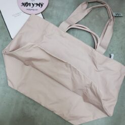 Túi VSX 433736 vải dù hồng nude chữ, ngang 56x cao 36x đáy 26cm..  Khóa dây kéo
