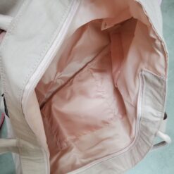 Túi VSX 433736 vải dù hồng nude chữ, ngang 56x cao 36x đáy 26cm..  Khóa dây kéo